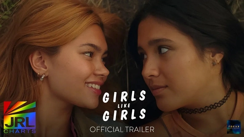 Two young women share a romantic moment in the Girls Like Girls official movie trailer directed by Hayley Kiyoko.